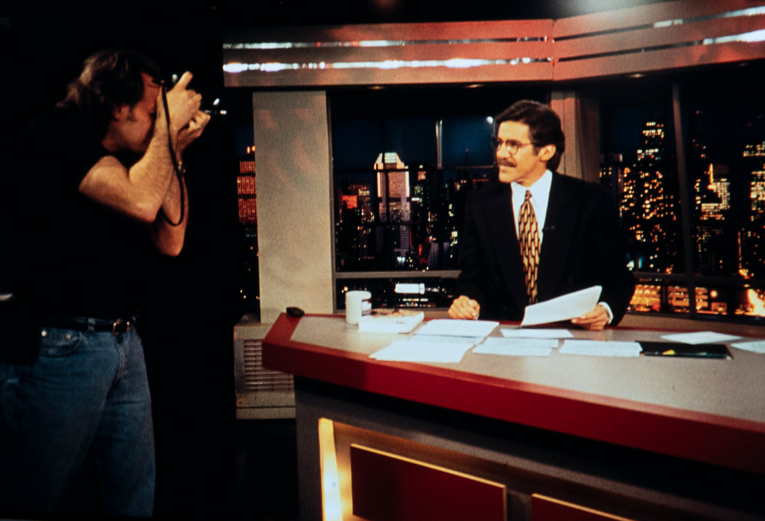 Picture Photograph of Joe Polillio photographing Geraldo Rivera in the CNBC Studios