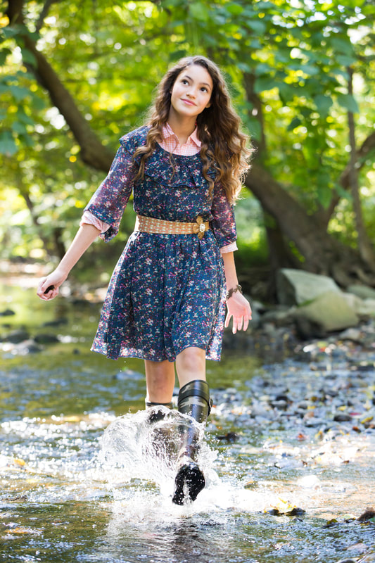 Photograph of fashionable teen girl in Creek